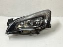 OPEL ASTRA IV 4 REFLEKTOR LEWY 1EG010011-61 ORG FV WYS 24H