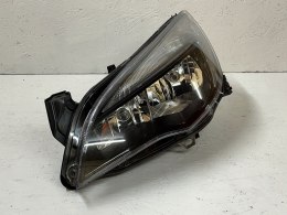 OPEL ASTRA IV 4 REFLEKTOR LEWY 1EG010011-61 ORG FV WYS 24H